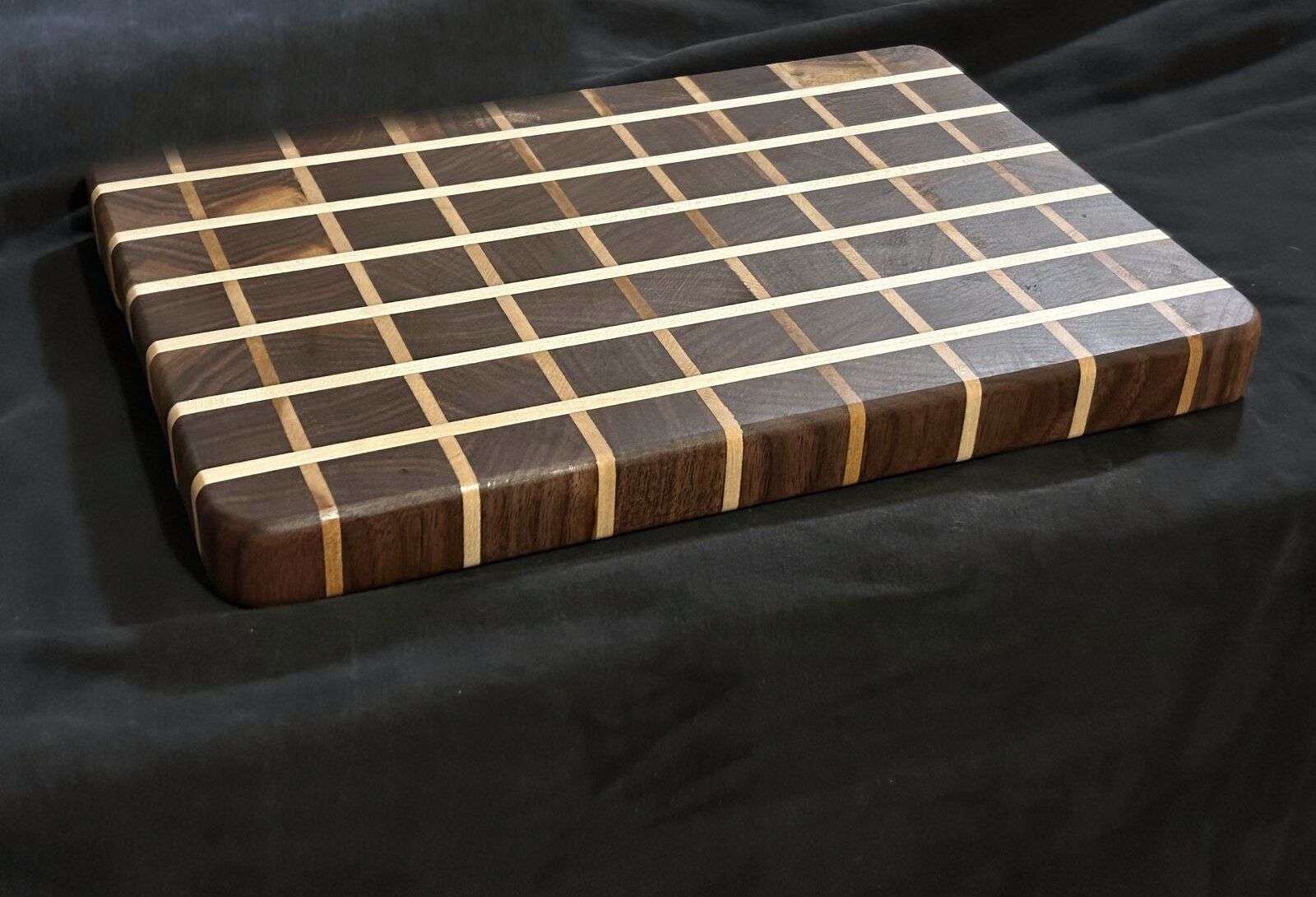 End-grain walnut and maple cutting board in a grid pattern
